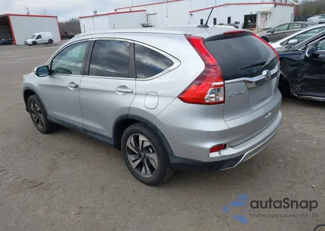 2016 Honda Cr-V Touring z USA, uszkodzony, nr VIN 5J6RM4H90GL067898